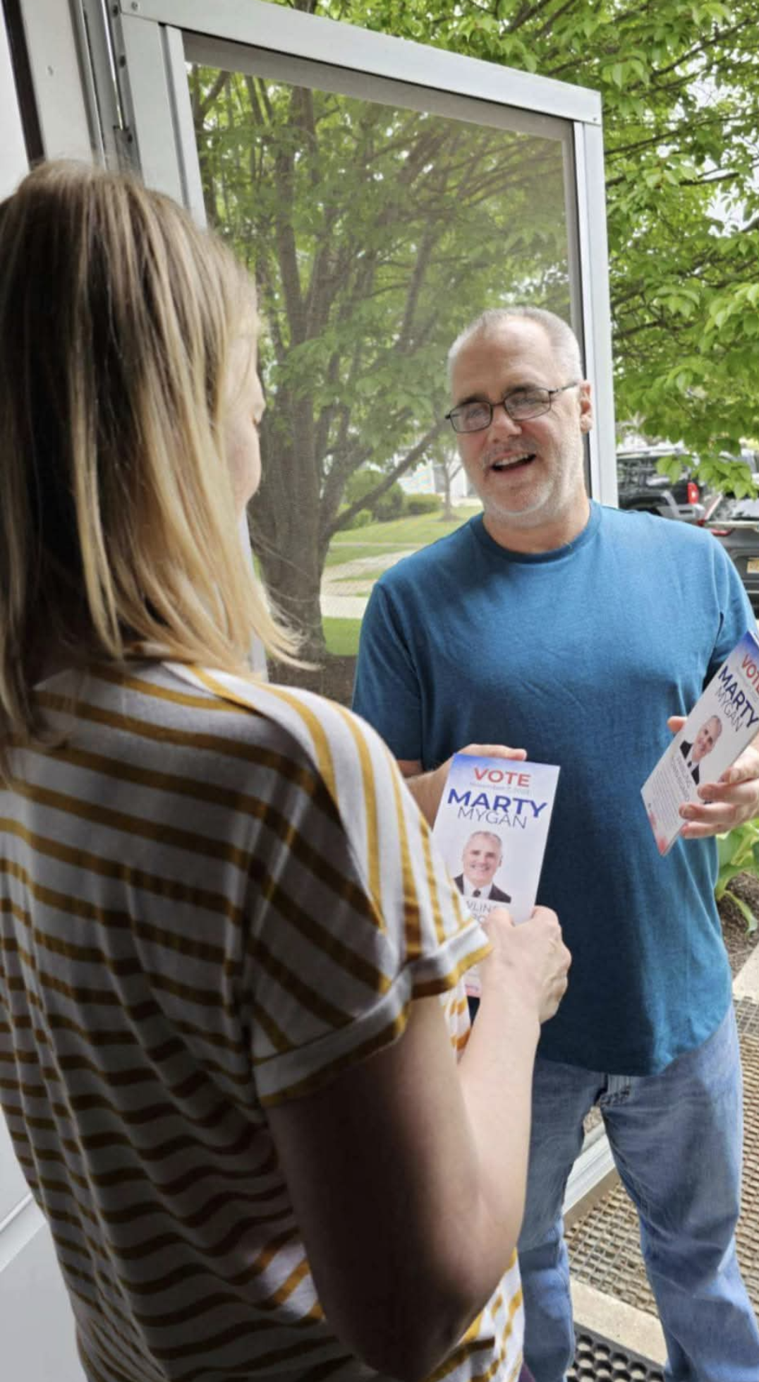 Marty Mygan talking with District 23 constituents